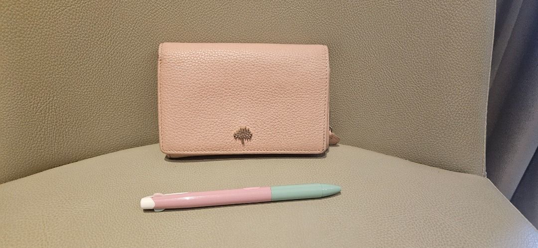 Mulberry Tree French Purse Wallet (Category: Luxury Bags & Wallets) located in Quezon City. Submitted by prelovedpieces0808 (Listing ID 1444549191, Image 1). Description: - Authentic Preloved Mulberry Tree French Purse Wallet in Rosewater Small Classic Grain with Gold Hardware - Crafted from premium textured leather - Multiple card slots for organization - Convenient zipped coin compartment - Secure snap button closure - Compact and small, fits e