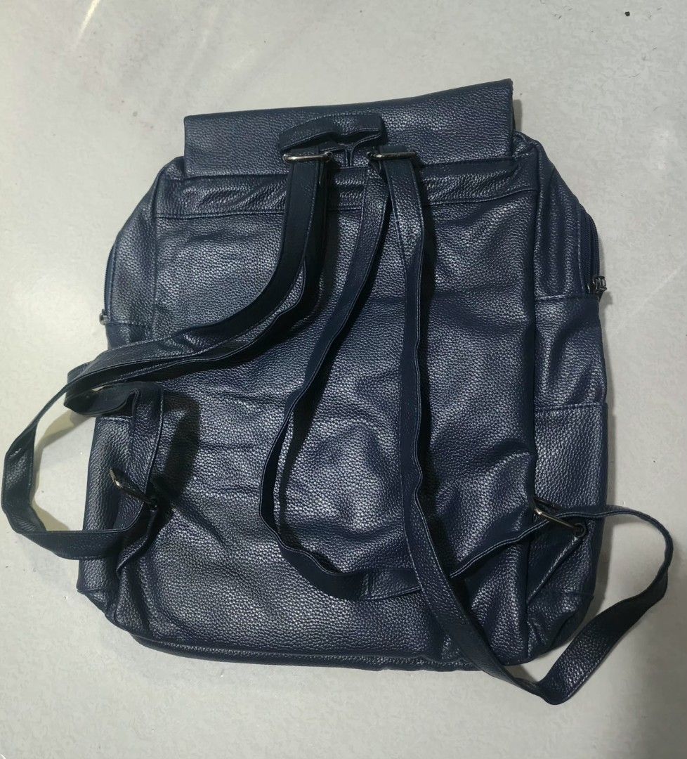Navy Blue Korean leather back pack (Category: Backpacks) located in Quezon City. Submitted by lordsblessing (Listing ID 1444560549, Image 3). Description: Bought this unbranded navy blue back pack bag in Korea. Used only once. Bag is still in pristine condition 😊.