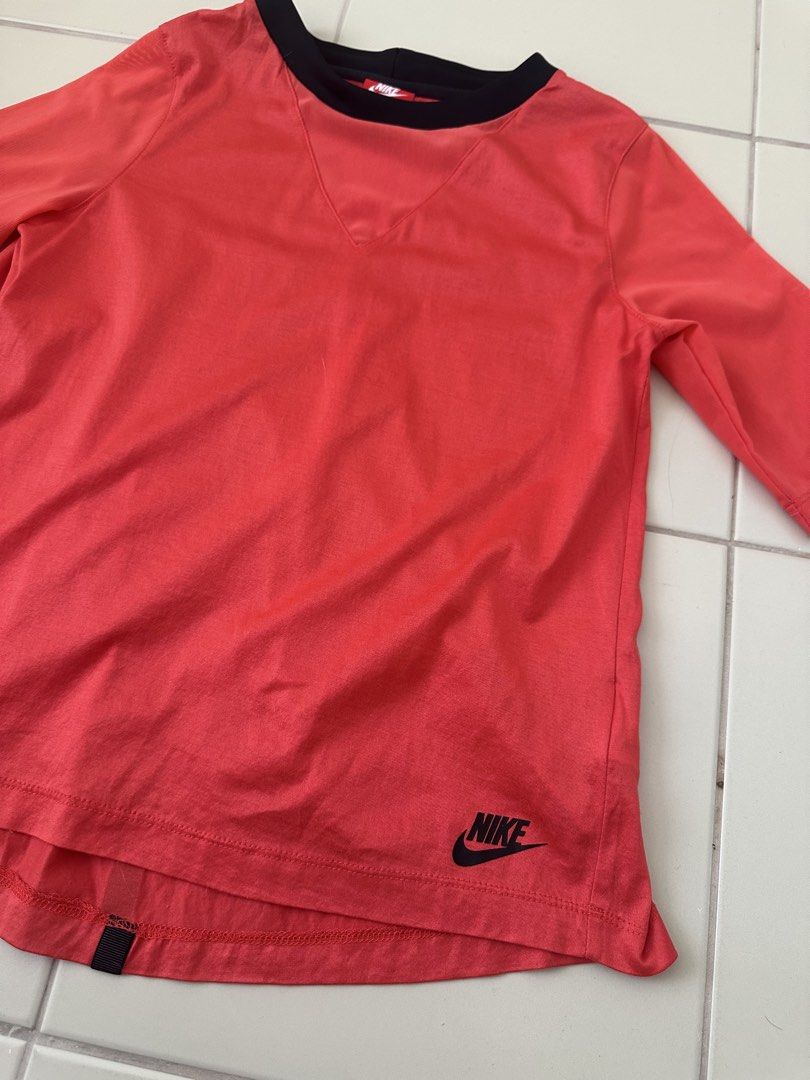NIKE active shirt red orange (Category: Shirts) located in Cavite. Submitted by jdfselectify (Listing ID 1444544706, Image 2). Description: Very good condition Fits S-M women Drifit material 17W x 21-23L.
