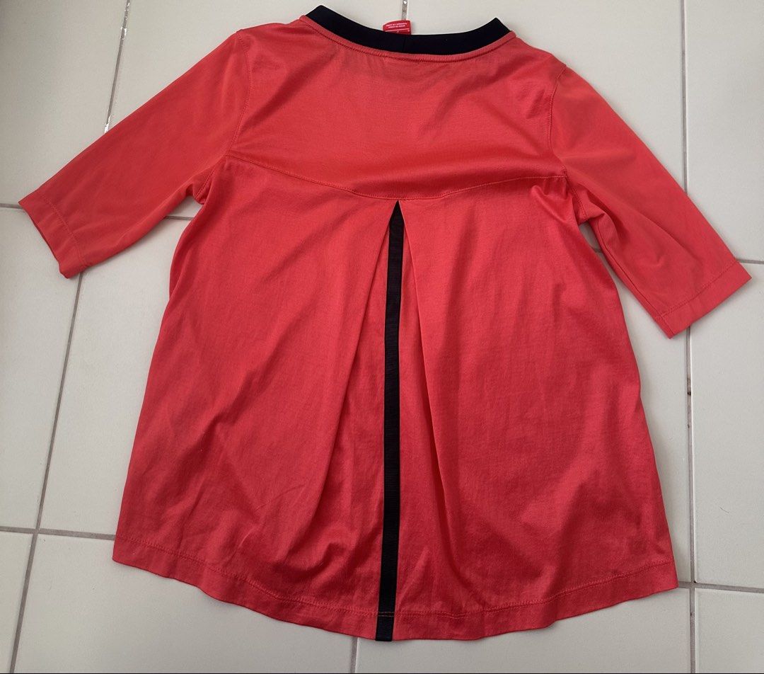 NIKE active shirt red orange (Category: Shirts) located in Cavite. Submitted by jdfselectify (Listing ID 1444544706, Image 3). Description: Very good condition Fits S-M women Drifit material 17W x 21-23L.