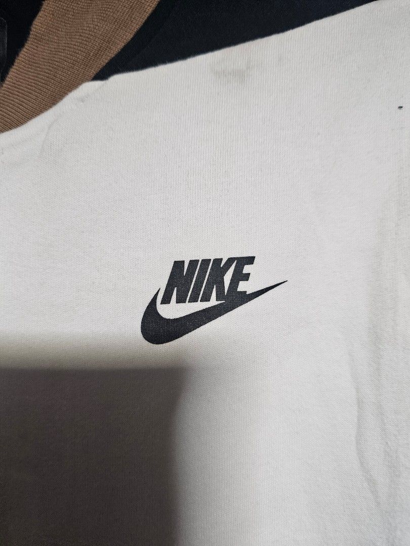 Nike tech fleece Bomber Jacket White Black Brown (Category: Coats, Jackets and Outerwear) located in Manila. Submitted by thrift_archive (Listing ID 1444645667, Image 2). Description: - Classic Nike Bomber Jacket - Colorway: White, Black, and Brown - Button closure for a secure fit - Iconic Nike logo embroidered on the chest - Ribbed collar, cuffs, and hem for comfort and style - Ideal for everyday casual wear - Please check photos for condition 