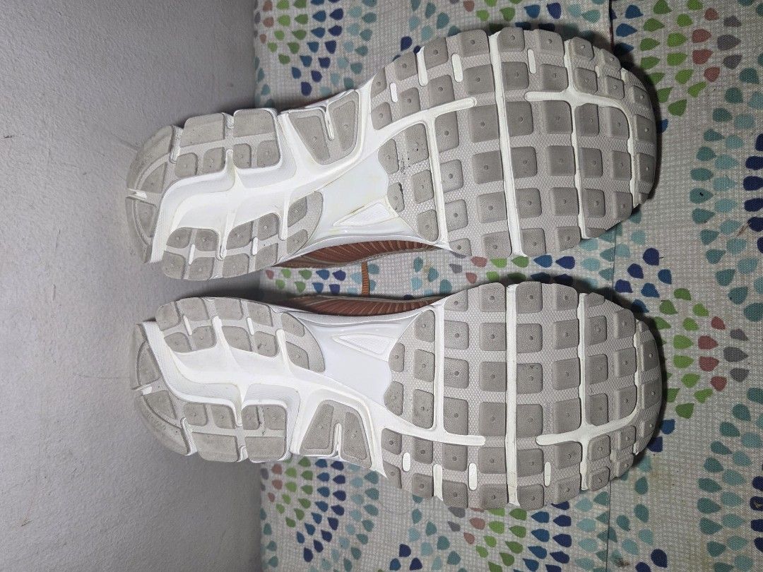 Nike Vomero 5 Monarch (Category: Sneakers) located in Las Pinas. Submitted by milo0502 (Listing ID 1444595655, Image 3). Description: - Orange and white Nike running shoes - Breathable mesh upper - White sole with excellent grip - Bright orange laces - Ideal for running, workouts, or casual wear - No box -used x3.