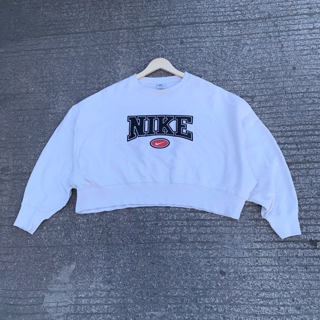 Nike White Crewneck Sweatshirt Size (Category: Coats, Jackets and Outerwear) located in Mandaue City. Submitted by hannahitems (Listing ID 1444659984, Image 1). Description: Nike sportswear Pheonix Fleece Embroidered M on tag 28 width 21 length Excellent -450.