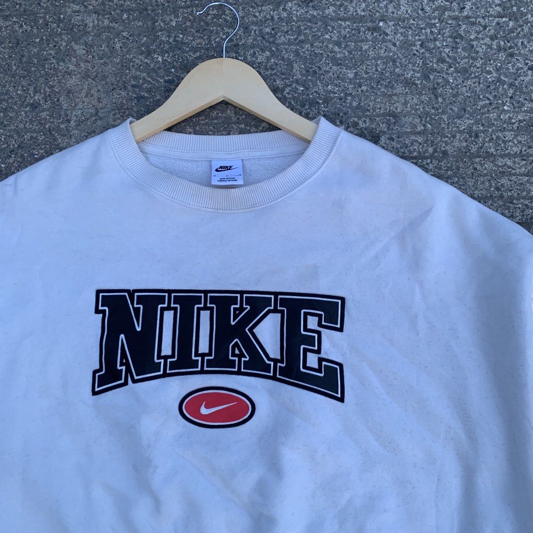 Nike White Crewneck Sweatshirt Size (Category: Coats, Jackets and Outerwear) located in Mandaue City. Submitted by hannahitems (Listing ID 1444659984, Image 3). Description: Nike sportswear Pheonix Fleece Embroidered M on tag 28 width 21 length Excellent -450.