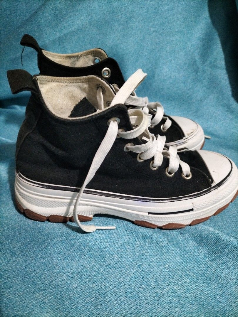 Ollie Black High-top Sneakers (Category: Sneakers) located in Urdaneta. Submitted by bernizonlineshop (Listing ID 1444676816, Image 2). Description: Black Ollie high-top sneakers. Model name is Justen. Lace-up closure. Platform sole. Made in China. Still a lot of life left in them. RFS: naliitan na ng anak ko. grade 5 na anak ko. size 1 23cm nearly 24cm.