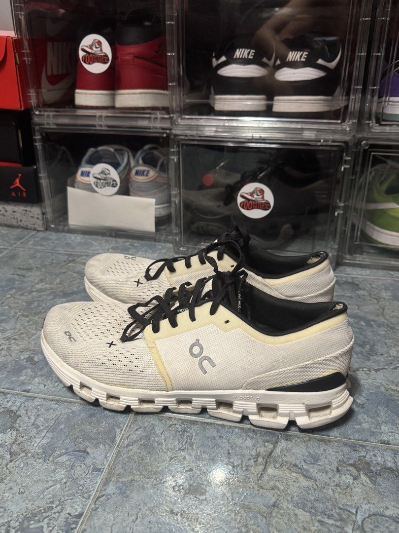 ON Cloud X4 Ivory Black (Category: Sneakers) located in Makati City. Submitted by vinsanity41546 (Listing ID 1444651273, Image 3). Description: - ON Cloud X4 running shoes - Color: White with black accents - Ideal for running and everyday wear - Soles show some signs of use, but plenty of life remaining - Black laces included - Feel free to ask any questions!.