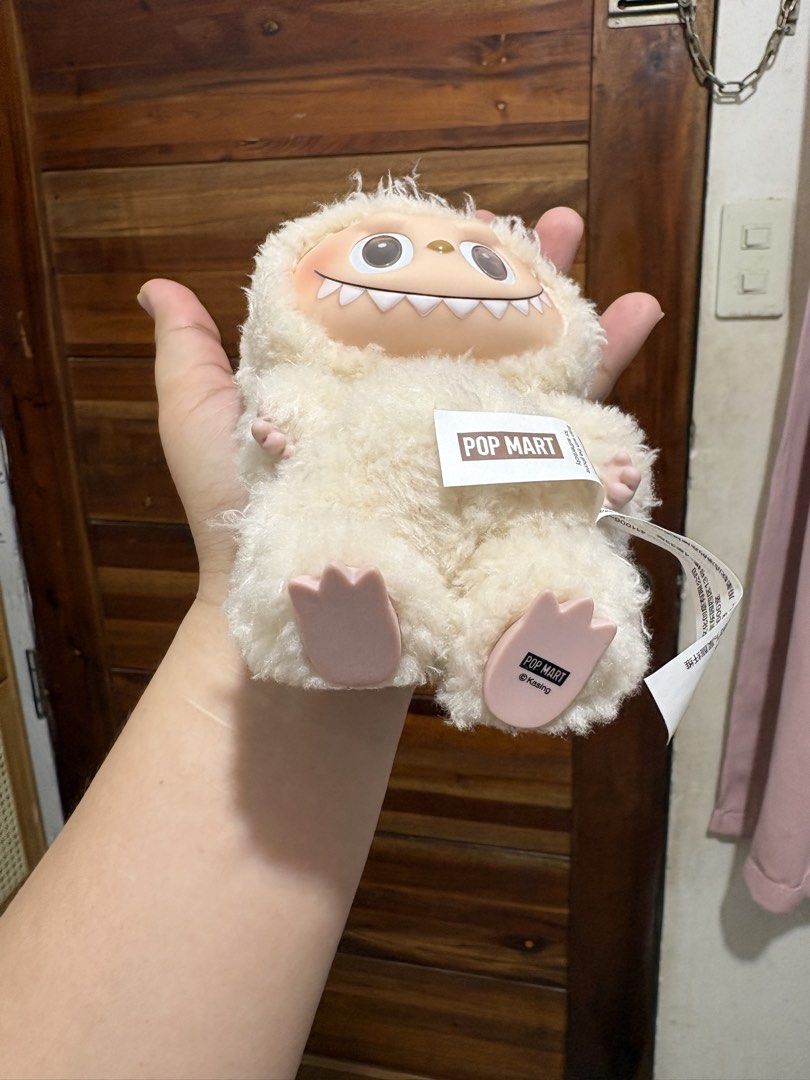 Original Pop Mart Labubu V1 Soymilk (Category: Plushies & Soft Toys) located in Santa Cruz. Submitted by rosie0601 (Listing ID 1444499433, Image 2). Description: - Cute and fluffy plush keychain from Pop Mart. - Features a popular character from 'The Monsters' series. - Comes with a convenient keyring attachment. - Ideal for decorating bags, backpacks, or your keys. - Made from soft, huggable material. - A must-have for collectors or anyone looki