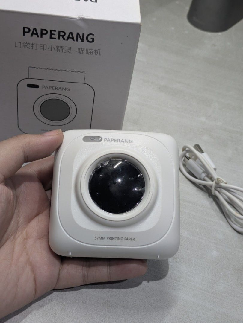 PAPERANG P1 Pocket Printer - TESTED WORKING (Category: Printers, Scanners & Copiers) located in Malabon City. Submitted by AlingJema (Listing ID 1444632072, Image 3). Description: Personally owned, kept for years. Needs thermal paper. Location: Malabon Courier: JnT or LBC.
