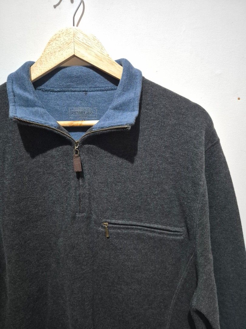 PENDLETON Dark Grey Quarter Zip Fleece Pullover Sweater (Category: Coats, Jackets and Outerwear) located in Bulacan. Submitted by vince4593 (Listing ID 1444643364, Image 2). Description: - Dark grey quarter zip pullover sweater - Features a contrasting blue collar - Includes a small zippered chest pocket - Made from soft fleece material - Perfect for layering or wearing solo - Offers a comfortable and casual style.