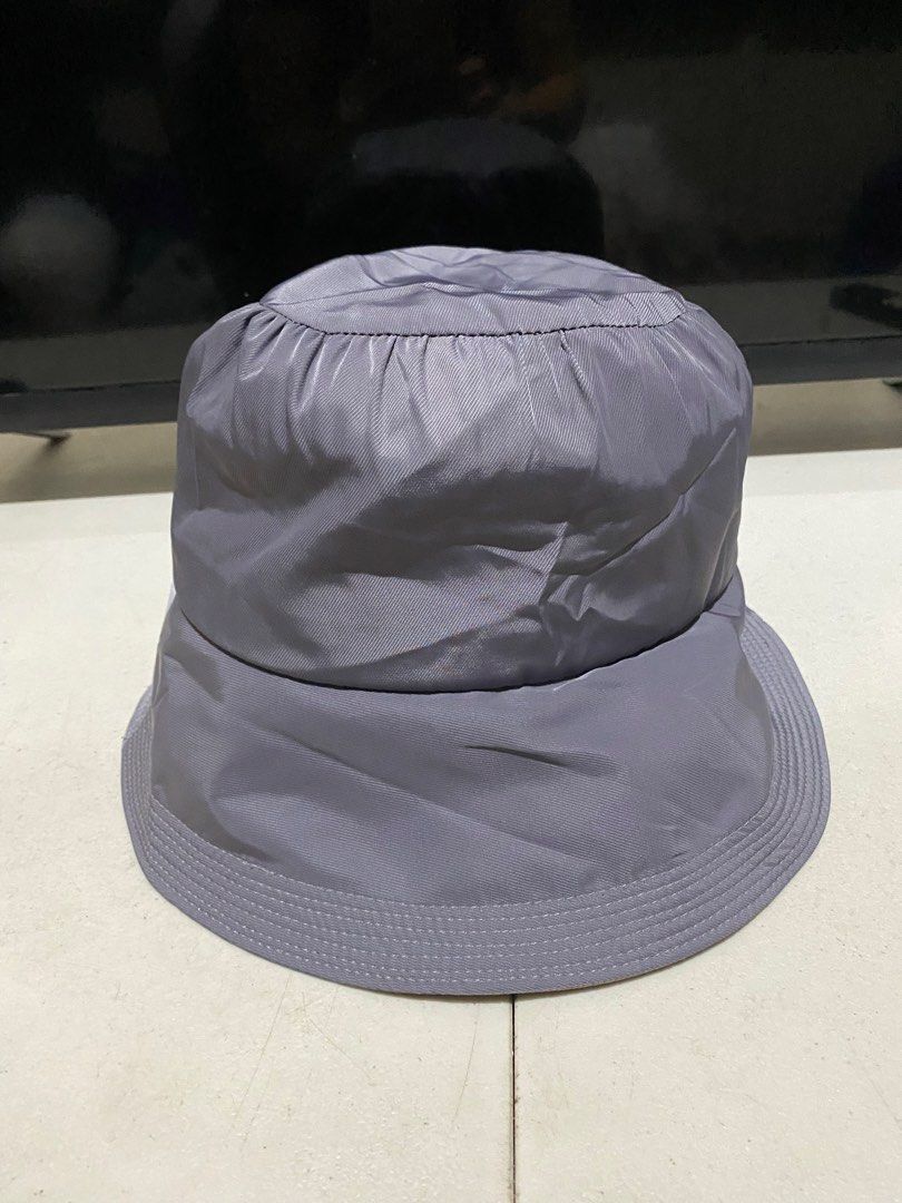 Pierre Cardin Paris Bucket Hat Grey (Category: Hats & Beanies) located in Manila. Submitted by resi.diaz (Listing ID 1444659356, Image 1). Description: - Brand: Pierre Cardin Paris - Color: Grey - Material: Shiny fabric - Features: Side brand logo - Style: Bucket hat - Occasion: Sunny days, casual wear - Benefits: Easy to pack, versatile styling.