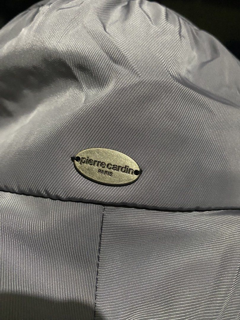 Pierre Cardin Paris Bucket Hat Grey (Category: Hats & Beanies) located in Manila. Submitted by resi.diaz (Listing ID 1444659356, Image 3). Description: - Brand: Pierre Cardin Paris - Color: Grey - Material: Shiny fabric - Features: Side brand logo - Style: Bucket hat - Occasion: Sunny days, casual wear - Benefits: Easy to pack, versatile styling.