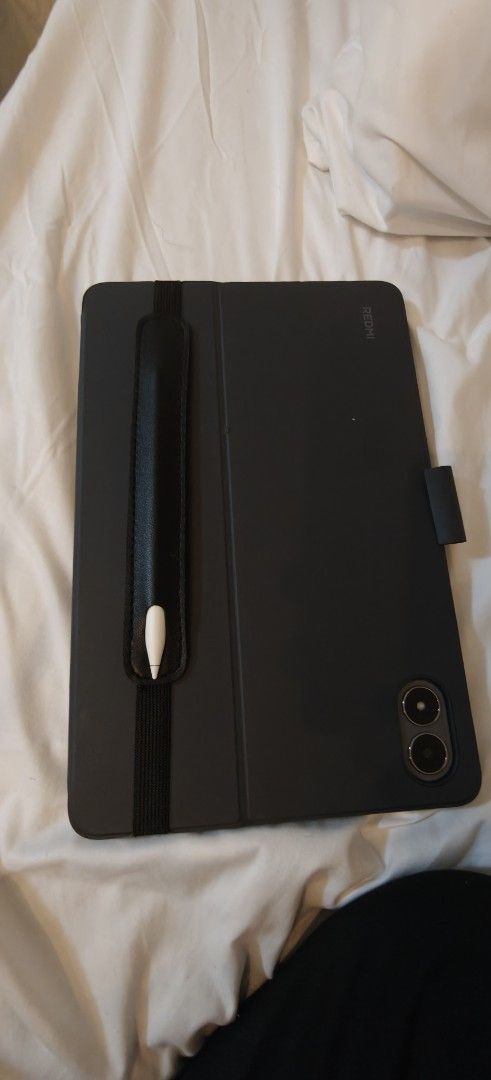 Pristine Redmi Pad 2 Pro 5G (Category: iPad) located in Manila. Submitted by trustedthrifter (Listing ID 1444602027, Image 2). Description: - Pristine Redmi Pad 2 Pro 5G - 128GB storage - 5G connectivity - Includes keyboard case - Includes stylus holder.