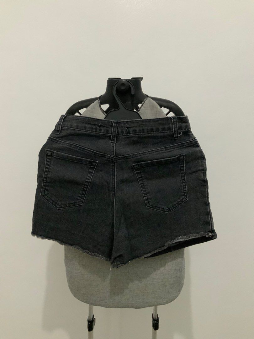 Raleigh Denim Skort Size 28 (Category: Skirts) located in Taguig. Submitted by mstyphoon (Listing ID 1444531404, Image 3). Description: - Raleigh black denim skirt - Button front closure - Raw hem detail - Waist: 28 inches - Length: 12.5 inches - Ideal for casual wear.