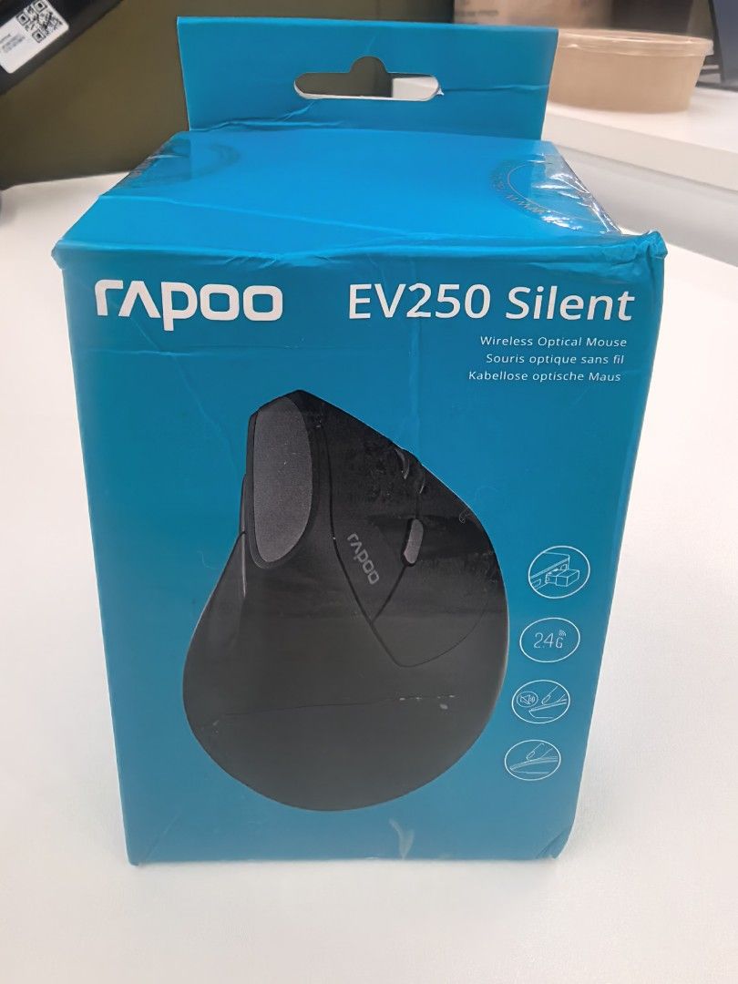 Rapoo EV250 Silent Wireless Vertical Optical Mouse (Category: Mouse & Mousepads) located in Taguig. Submitted by allav (Listing ID 1444645268, Image 2). Description: - Rapoo EV250 Silent Wireless Optical Mouse - Ergonomic Vertical Design for ultimate comfort - Enjoy a quiet workspace with silent clicks - Perfect for extended computer sessions - Comes in original packaging.