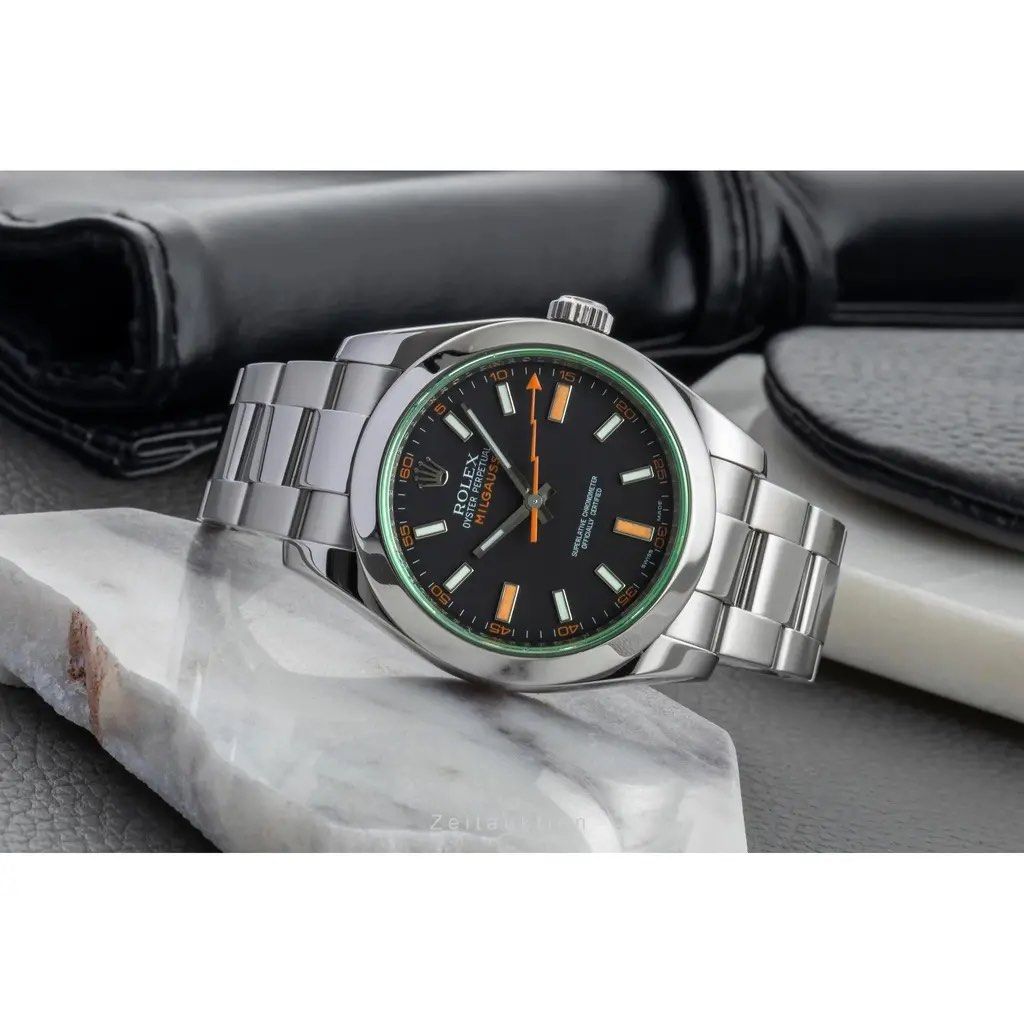 Rolex Oyster Perpetual Milgauss 116400GV Black Dial Watch (Category: Watches) located in Singapore. Submitted by skiii99 (Listing ID 1444584810, Image 2). Description: - Rolex Milgauss 116400GV - Discontinued model - 40mm stainless steel case - Black dial with iconic green accents - Oyster bracelet - Water resistant up to 100m - Caliber 3131 movement -some seals still on - Comes with original box and warranty card.