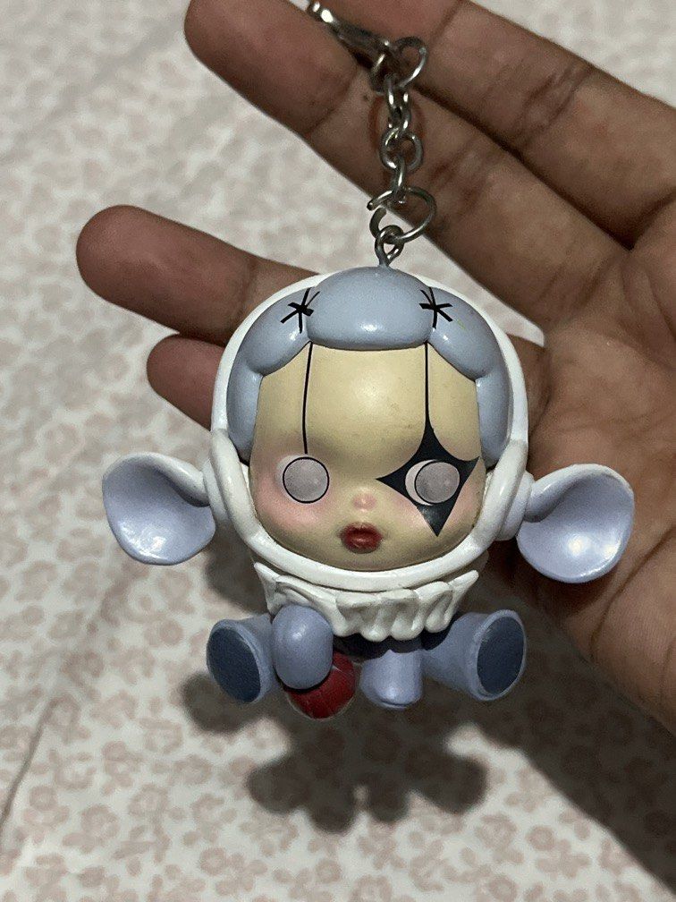 Skullpanda The Elephant Colllectible Key Chain (Category: Designer & Blind Box Toys) located in Paranaque City. Submitted by flees.thrift10 (Listing ID 1444615315, Image 2). Description: This is a POP MART Skullpanda “The Elephant” figure from “The Mare of Animals” series.The collectible figure is designed as a themed doll pendant with a keychain attachment..