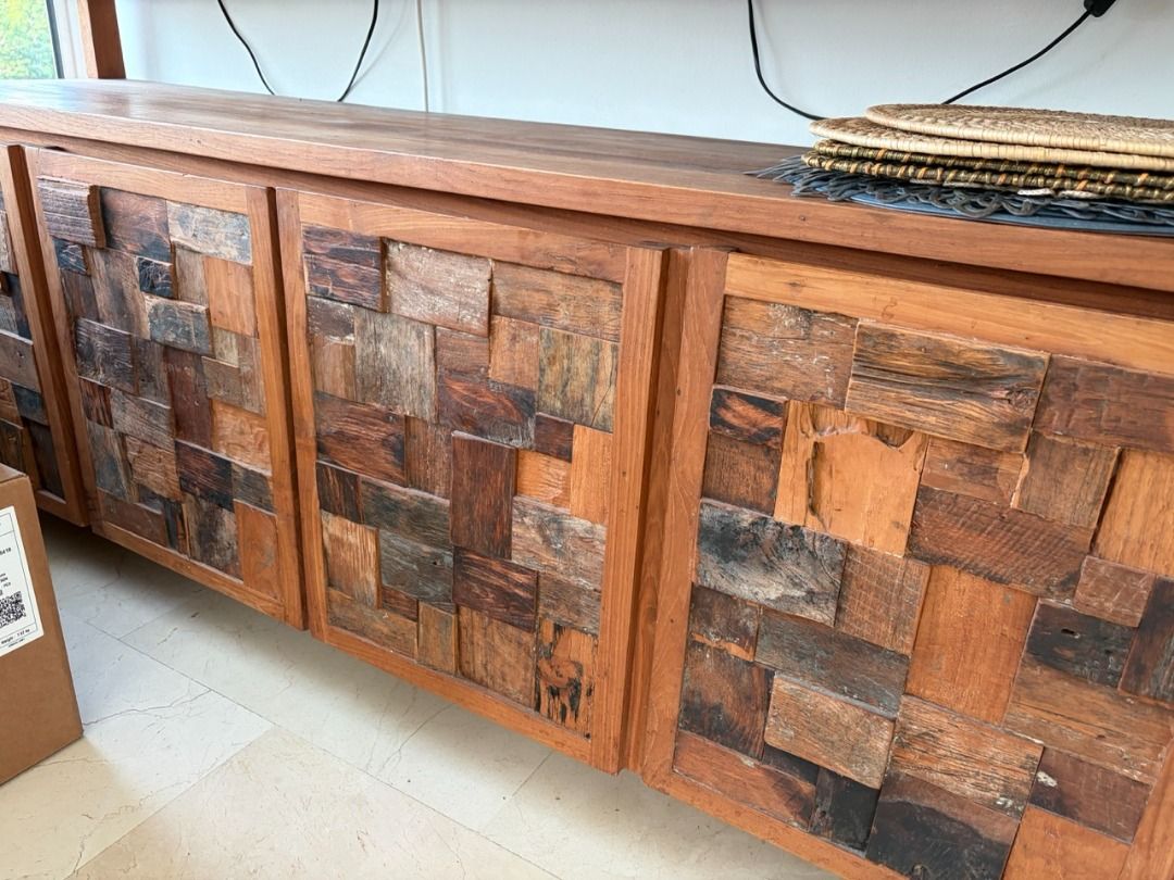 Solid Teak Sideboard (Category: Shelves, Cabinets & Racks) located in Singapore. Submitted by pushpush79 (Listing ID 1444594031, Image 2). Description: - Solid teak wood sideboard - Immaculate condition - Unique textured front - Multiple doors with ample storage and shelves - Spacious top surface for display - Ideal for living room or dining area - Dimensions: 1.8m L x 0.9m H x 0.46m D Selling because too big for our new flat.
