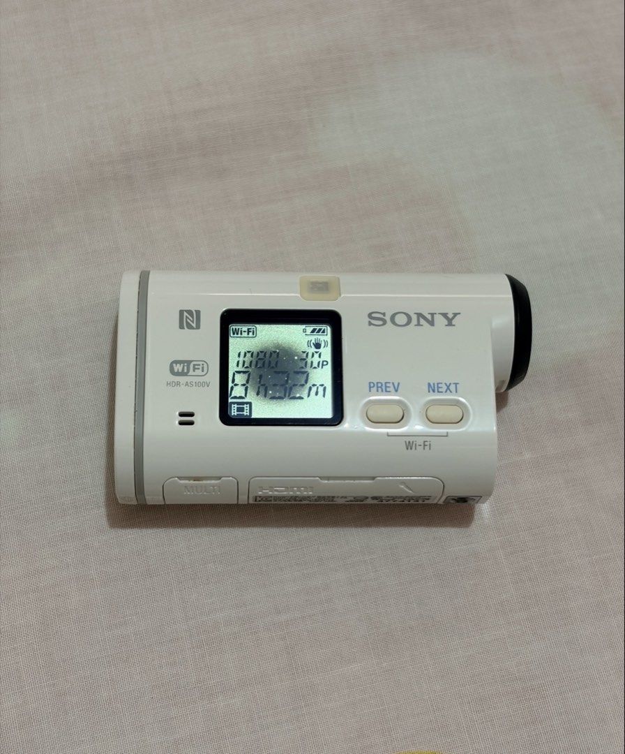 Sony HDR AS100v Action Camera (Category: Video Cameras) located in Muntinlupa City. Submitted by anders.ps (Listing ID 256655135, Image 3). Description: SONY Action Camera HDR AS100v for sale! 2.5K is the last price. Lightly used. 100% working, only issue is the black spot on the lcd of the camera - see last photo. Complete packaging and accessories. Full HD action cam with live view remote • Record up to 1080 60p (50mbps) video • Capture 13.5 MP
