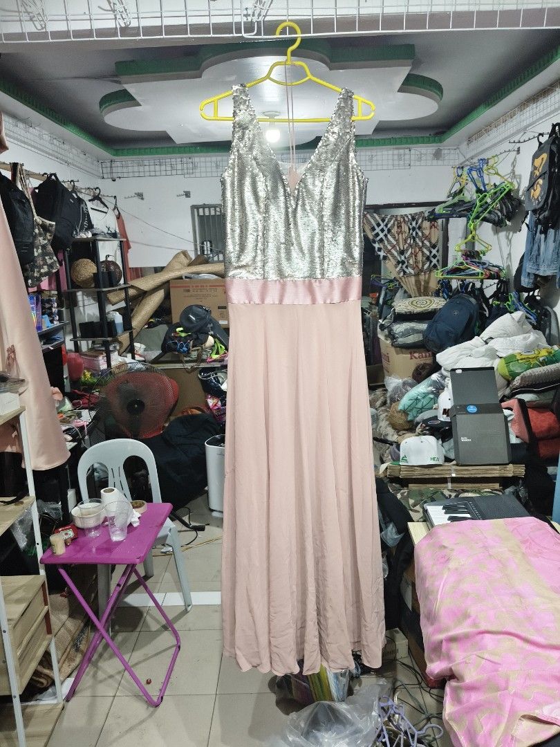 Sparkly Sequin Top Maxi Dress (Category: Dresses) located in Del Monte. Submitted by anitagalan89774 (Listing ID 1444533727, Image 2). Description: - Stunning long dress with a sparkly sequin top. - Flowy soft pink fabric for the skirt. - Elegant ribbon detail at the waist. - Ideal for parties, weddings, and formal occasions. - Designed for a flattering and comfortable fit..