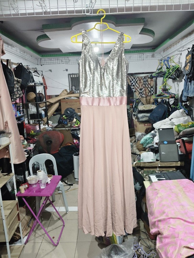 Sparkly Sequin Top Maxi Dress (Category: Dresses) located in Del Monte. Submitted by anitagalan89774 (Listing ID 1444533727, Image 3). Description: - Stunning long dress with a sparkly sequin top. - Flowy soft pink fabric for the skirt. - Elegant ribbon detail at the waist. - Ideal for parties, weddings, and formal occasions. - Designed for a flattering and comfortable fit..