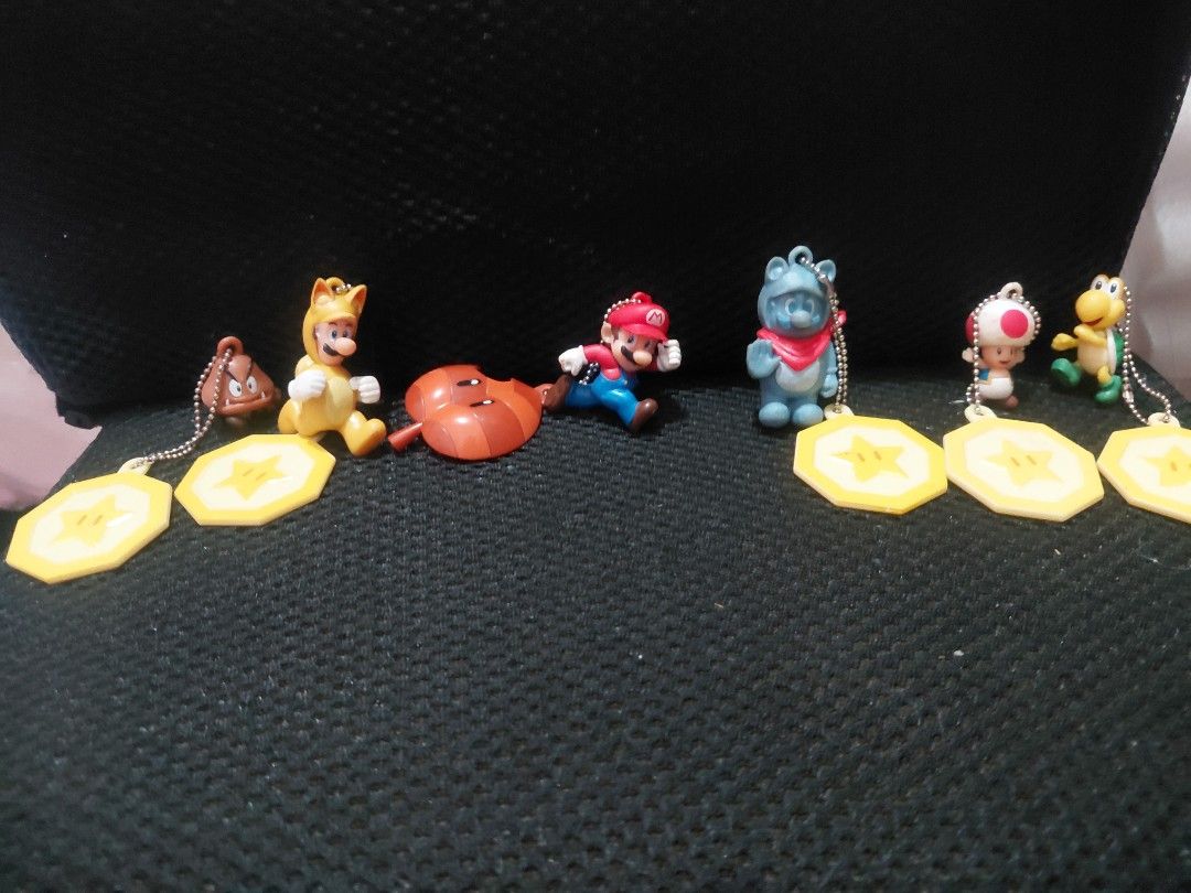 SUPER MARIO SMALL CHARMS KEYCHAINS COLLECTION (Category: Character Goods) located in Manila. Submitted by bashamylove0116 (Listing ID 1444548938, Image 1). Description: Hey Super Mario collectors! Lot of 6 Syper Mario small charms/keychains See photos to appreciate From Japan #supermario #mariokeychains.