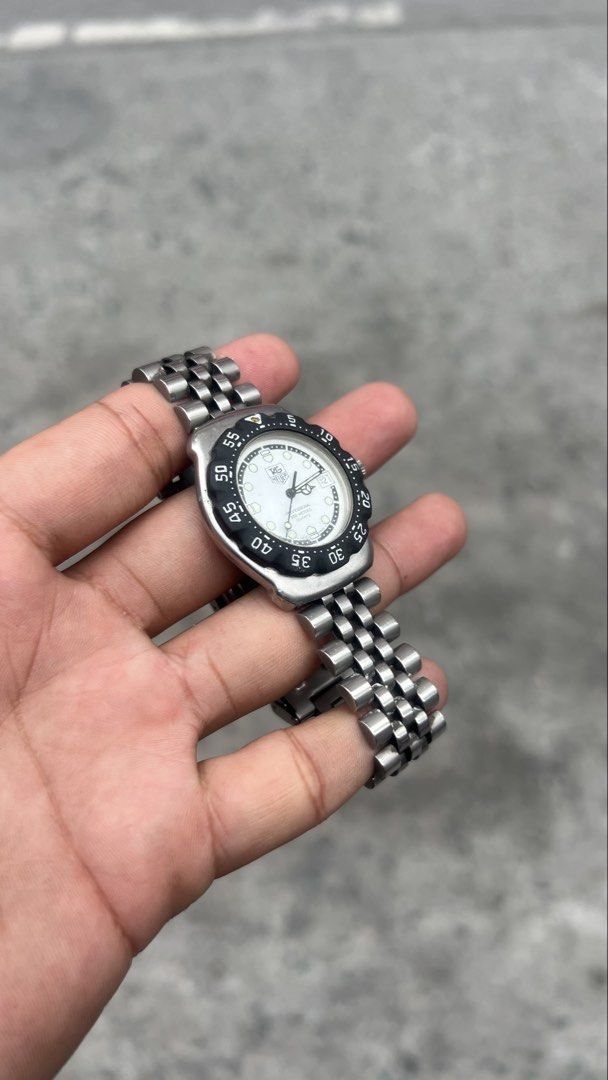 TAG Heuer Formula 1 Classic “Panda” mens (Category: Luxury Watches) located in Caloocan City. Submitted by _alennchan (Listing ID 1444590425, Image 2). Description: TAGa Heuer Formula 1 Classic “Panda” mens - Condition: 9.8/10 - No issue/ Mint condition - Up to 8.5 Wrist Size - Case size approx 36mm - Rotating bezzel - Quartz Movement - Comes with replacement box - Money back if provenfake x10 Inclusions: Inner box, Outer Box, Unit, Manuals & Pap