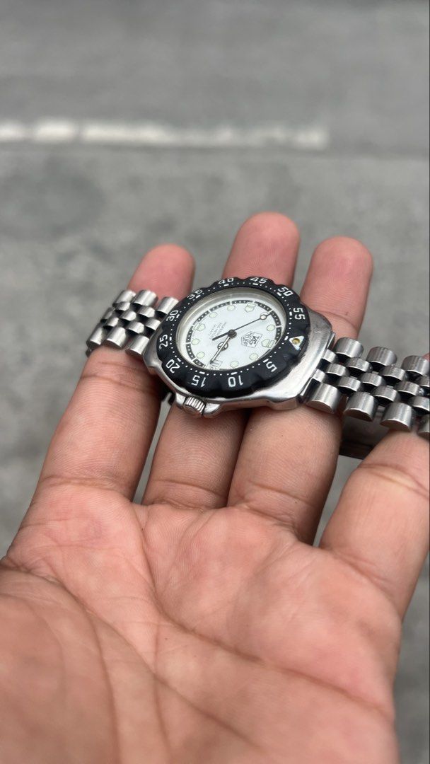 TAG Heuer Formula 1 Classic “Panda” mens (Category: Luxury Watches) located in Caloocan City. Submitted by _alennchan (Listing ID 1444590425, Image 3). Description: TAGa Heuer Formula 1 Classic “Panda” mens - Condition: 9.8/10 - No issue/ Mint condition - Up to 8.5 Wrist Size - Case size approx 36mm - Rotating bezzel - Quartz Movement - Comes with replacement box - Money back if provenfake x10 Inclusions: Inner box, Outer Box, Unit, Manuals & Pap