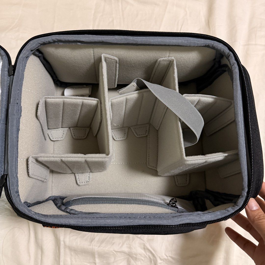 Tarion Camera Bag Insert Padded Organizer (Category: Camera Bags & Carriers) located in Makati City. Submitted by prelovedbychiin (Listing ID 1444557657, Image 2). Description: - Black camera bag insert - Adjustable dividers for customizable space - Front flap with zippered pocket for accessories - Dimensions: 27cm x 22cm x 16cm - Ideal for protecting your camera equipment Used once .