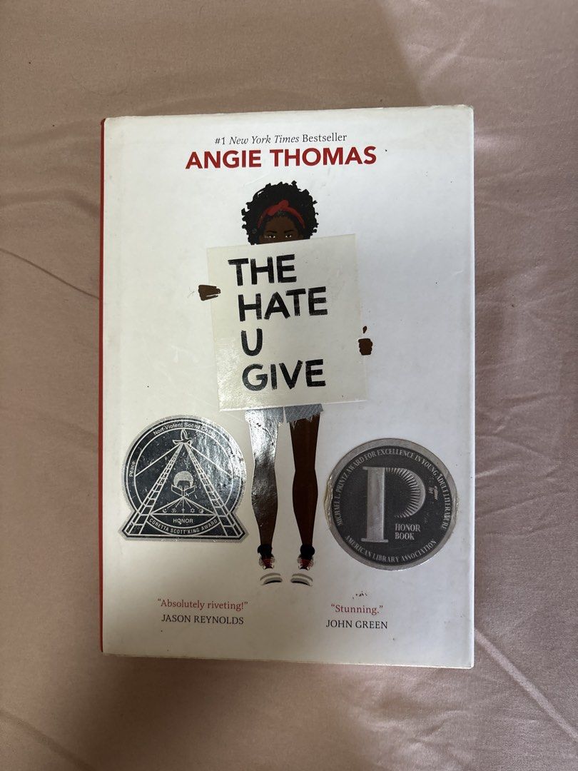 The Hate U Give by Angie Thomas (hardbound) (Category: Storybooks) located in Manila. Submitted by declutterbybeans (Listing ID 1444571651, Image 1). Description: - The Hate U Give by Angie Thomas - Notes: no annotations oxidized pages at the side.