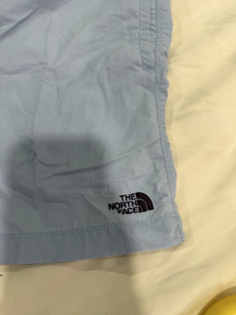 The North Face Light Blue M/M Shorts (Category: Shorts) located in Quezon City. Submitted by jiafoo (Listing ID 1444613722, Image 2). Description: - Light blue shorts from The North Face - Size Medium (M) adjustable w belt lock qsize 29 to 34 - Elastic waistband with adjustable drawstring - Perfect for casual outings or light activities - Comfortable and lightweight fabric - Features The North Face logo on the side.