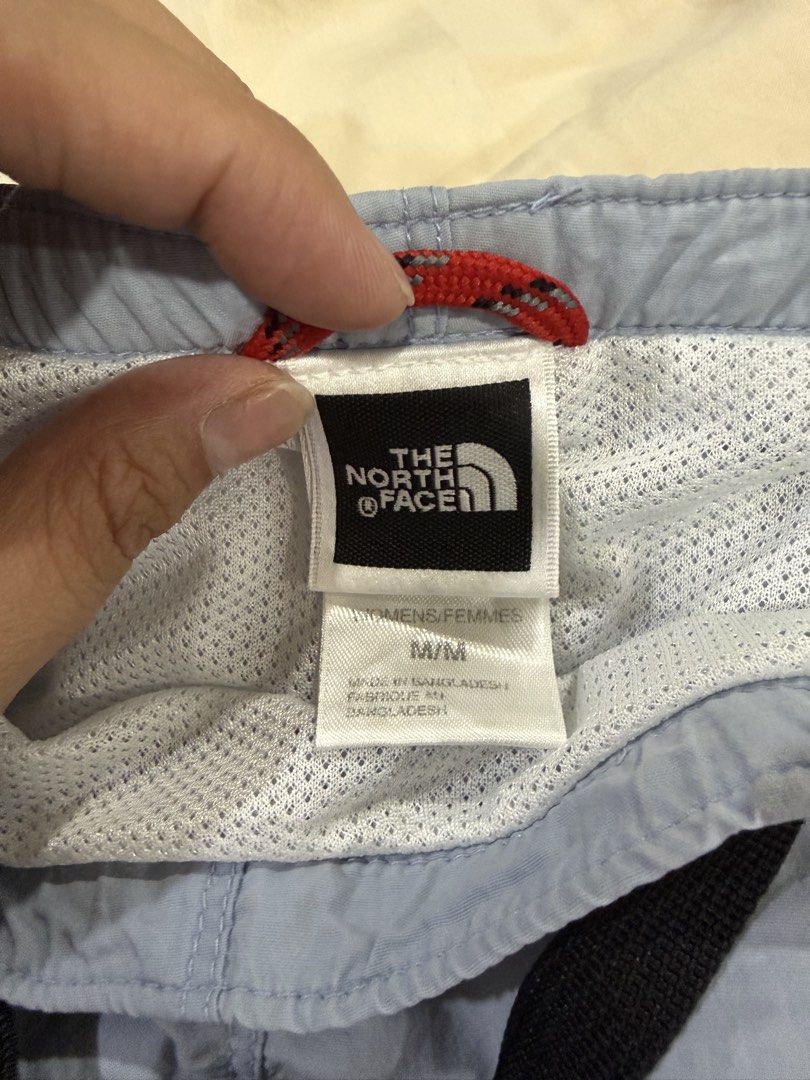 The North Face Light Blue M/M Shorts (Category: Shorts) located in Quezon City. Submitted by jiafoo (Listing ID 1444613722, Image 3). Description: - Light blue shorts from The North Face - Size Medium (M) adjustable w belt lock qsize 29 to 34 - Elastic waistband with adjustable drawstring - Perfect for casual outings or light activities - Comfortable and lightweight fabric - Features The North Face logo on the side.