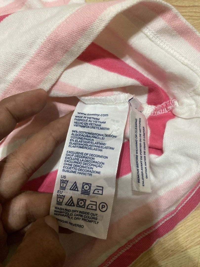Tommy Hilfiger Polo Shirt (Category: Others Tops) located in Zamboanga. Submitted by deensthrifting (Listing ID 1444658859, Image 2). Description: Tommy Hilfiger Polo Shirt Size S 9.5/10 Color rate Excellent condition No issue/Need wash 370+shipping fee.