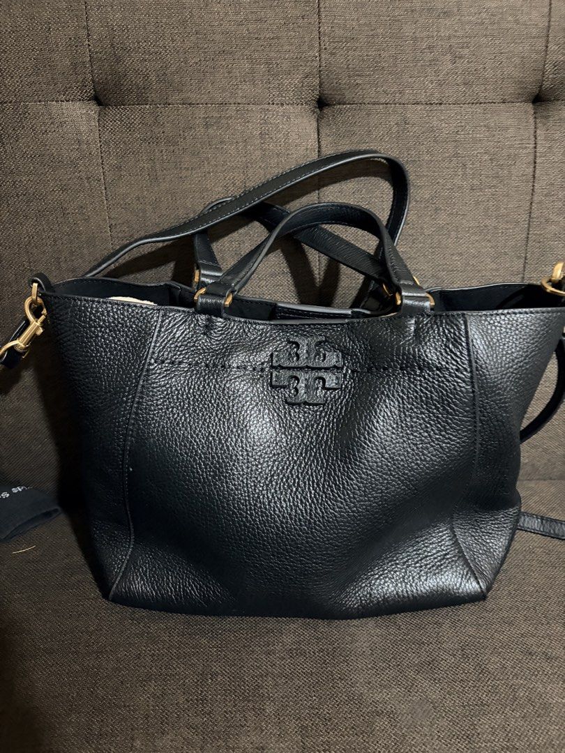 Tory Burch Black Leather Two Way Tote Bag (Category: Luxury Bags & Wallets) located in Quezon City. Submitted by pattycloset08 (Listing ID 1444549488, Image 1). Description: - Genuine black leather Tory Burch tote bag - Versatile with top handles and a detachable crossbody strap - Elegant gold hardware accents - Secure magnetic snap closure - Ample interior space for all your essentials - Ideal for everyday wear and errands Issue please see last 