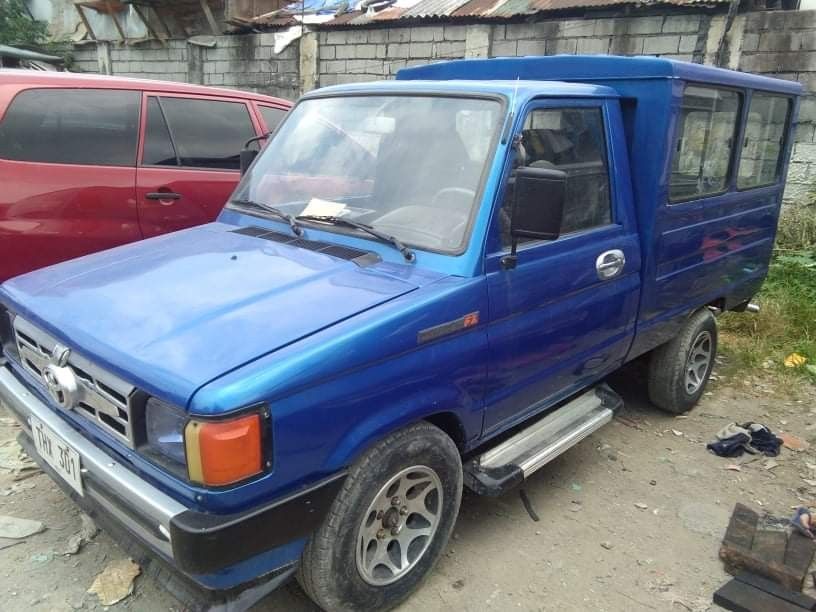 Toyota Tamaraw (Category: Used Cars) located in Pasig City. Submitted by abogadosupremo (Listing ID 1444506104, Image 1). Description: Tamaraw Darna 1993 Model , Engine condetion Gas 5k, Manual ,14 mags, Half body rear stainless, New sailing upholstery , Floering carfet w/o plastic,Roftop carrier,Two resirva wheel, Amarton battery, Stepboard front left and right alumminum ,Rear stepboard balbar stainless ,New seat rear ,Power window front left an