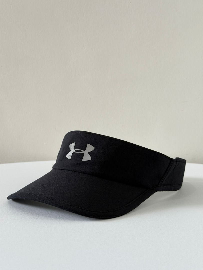 Under Armour Black Sports Visor (Category: Hats & Beanies) located in Abucay. Submitted by argarments.ph (Listing ID 1444522335, Image 2). Description: Tagged: One size fits all Condition: Excellent Issue(s): - - Black Under Armour visor - Ideal for sports and sunny days - Adjustable strap at the back for a custom fit - Made of 100% polyester - One size fits all - Simple and functional design.