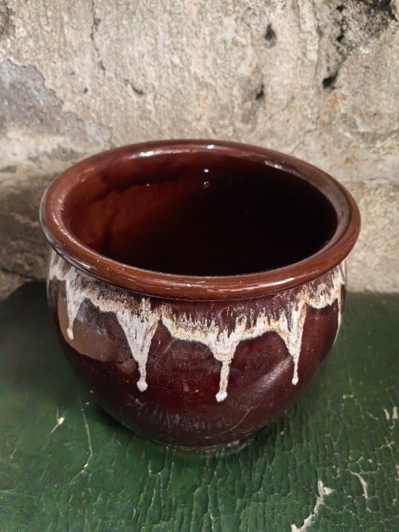 Vintage Brown Ceramic Pot with Lid Drip Glaze (Category: Other Kitchenware & Tableware) located in Paranaque City. Submitted by furugiyafinds (Listing ID 1444578468, Image 3). Description: - Brown ceramic pot with lid - Unique white drip glaze effect on rim - Approx. 8 inches tall (with lid) - Interior is glazed - Versatile: perfect for plants or storage - Adds a rustic touch to home decor.