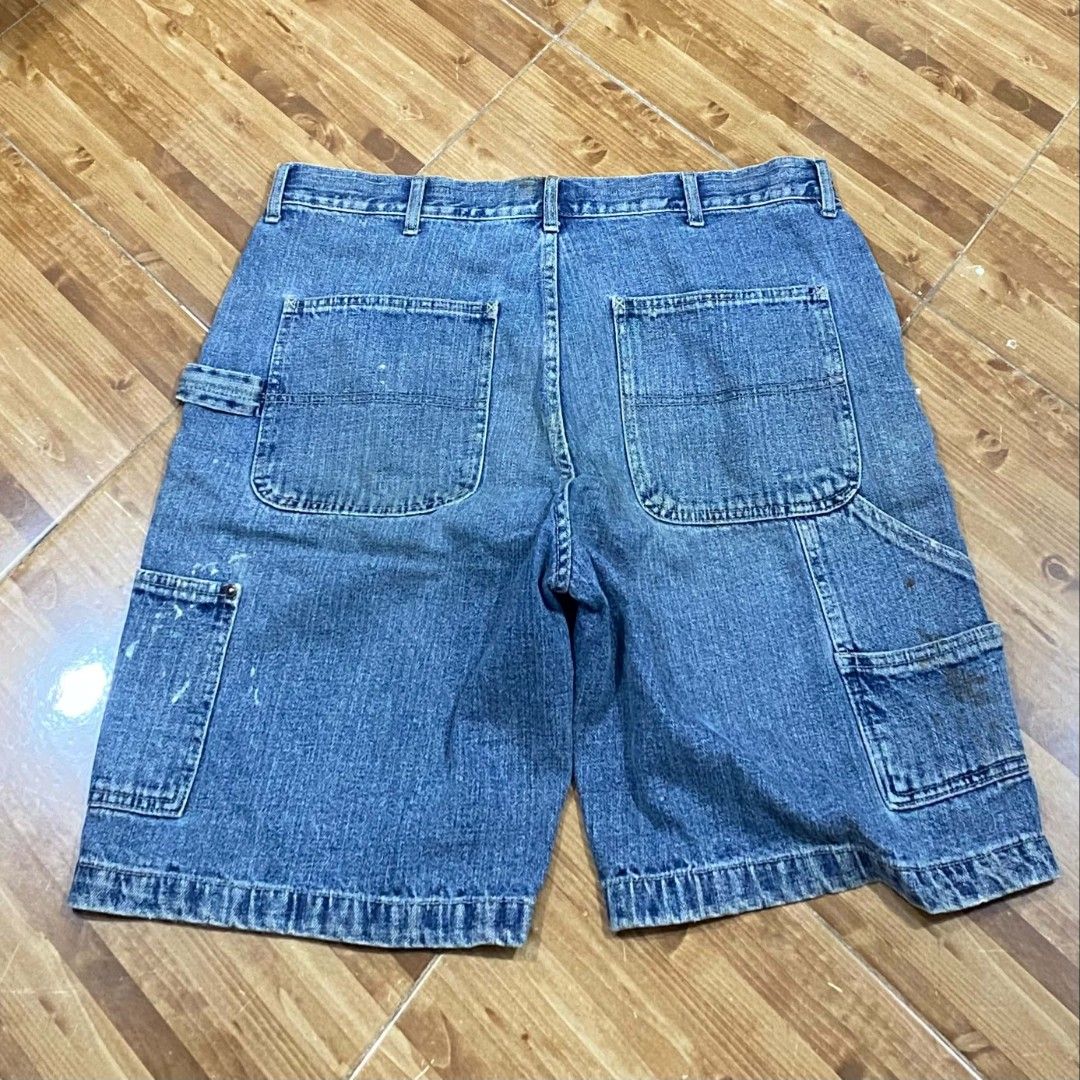 Vintage Dickies Carpenter Denim Shorts (Category: Shorts) located in Canaman. Submitted by marc.elizar (Listing ID 1444658521, Image 2). Description: - Classic blue denim carpenter shorts - Features iconic Dickies logo tag - Multiple utility pockets for storage - Unique paint splatters add a workwear aesthetic - Ideal for casual wear or a skater vibe.
