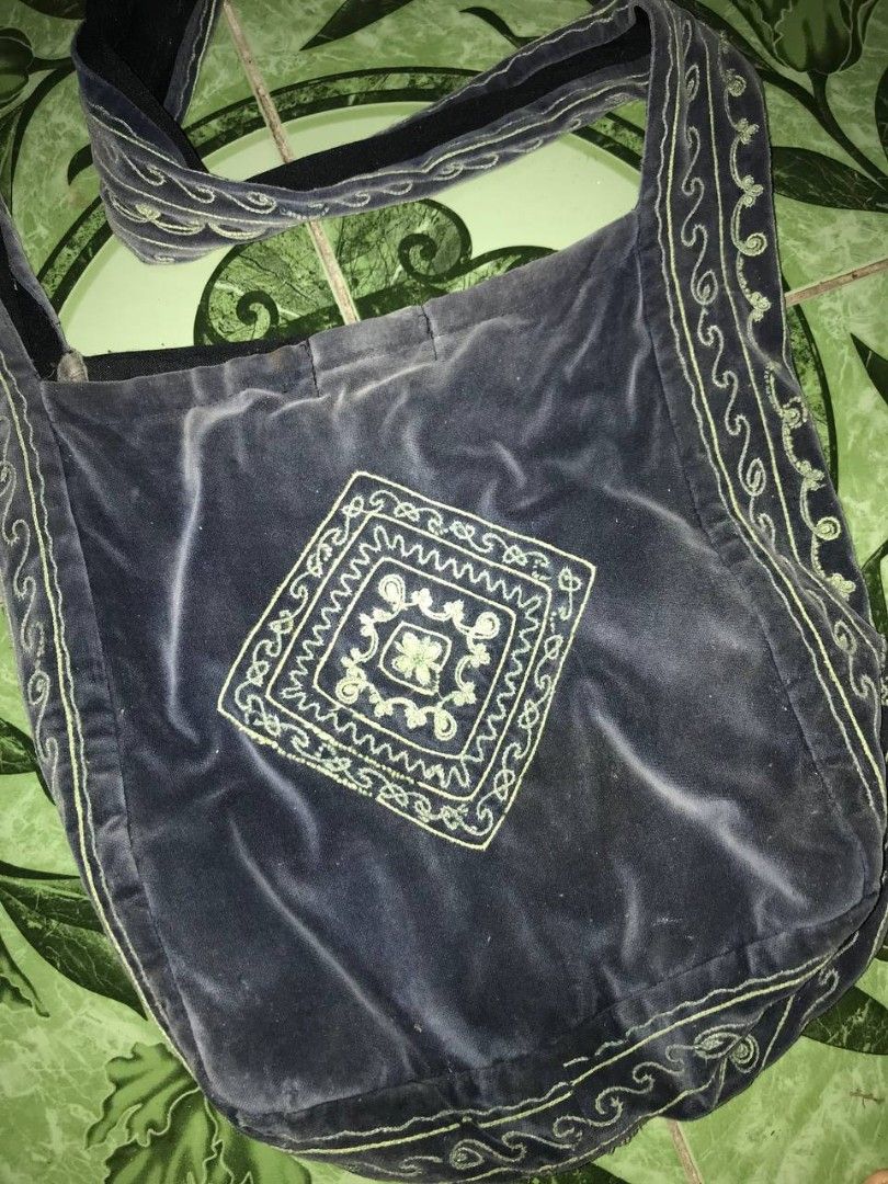 Vintage Boho Embroidered Velvet Shoulder Bag Grey Blue Crossbody Hobo Tote (Category: Cross-body Bags) located in Zamboanga. Submitted by ncollects (Listing ID 1444645269, Image 2). Description: Add a touch of effortless boho charm to your outfit with this vintage-style slouchy crossbody bag. Crafted from a soft, grey-blue velvet fabric, it features unique sage green geometric embroidery on the front panel and along the wide, comfortable shoulder