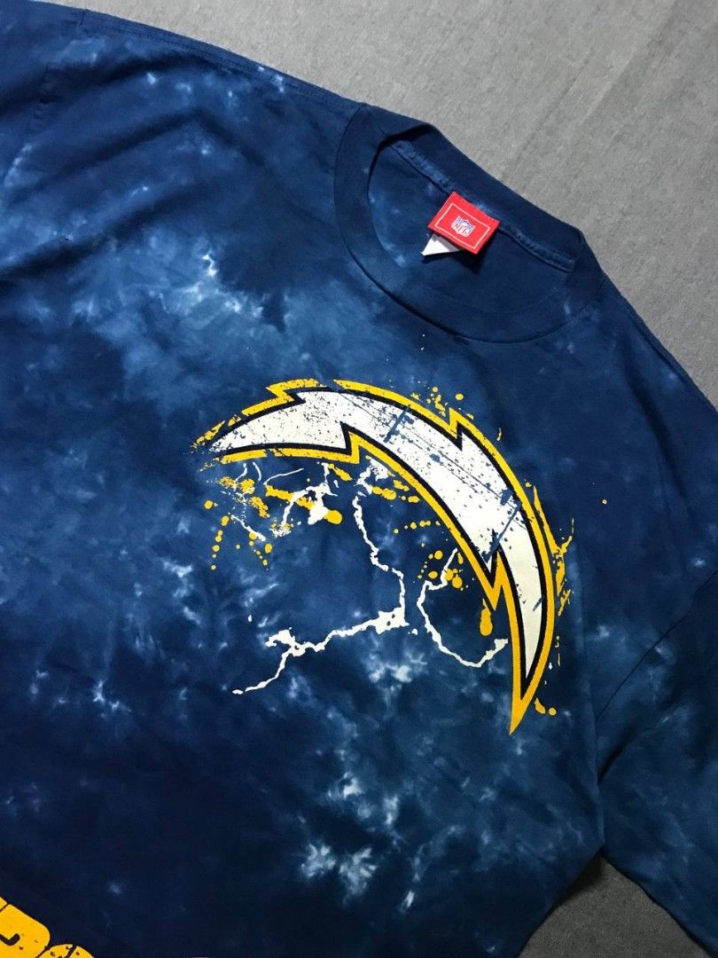 Vintages NFL 90s Chargers (Category: Activewear) located in Cavite. Submitted by thrift.cuhh (Listing ID 1444650551, Image 3). Description: Vintage 90s NFL Chargers tee Rare San Diego Chargers Tie Dye t-shirt Size - XL Width - 25.2" Length - 30.5" Color rate - 10/10 Dead Stock Crispy Condition Or best offer - Please double check the measurements and details before commenting mine. - Color may vary due to lightings. - All measurements are in inche