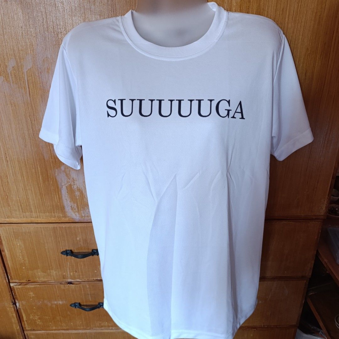 White SUUUUGA Graphic T-shirt (Category: Shirts) located in Las Pinas. Submitted by min_yanna (Listing ID 1444544977, Image 2). Description: A Yoongi stan must-have! Gently used. Free size but will fit XS (loose fit) to M (semi body hugging) best. Cotton spandex material. No stains or rips. MOP: Gcash or BDO MOD: JnT or SDD Item location: Pamplona Uno, Las Piñas.