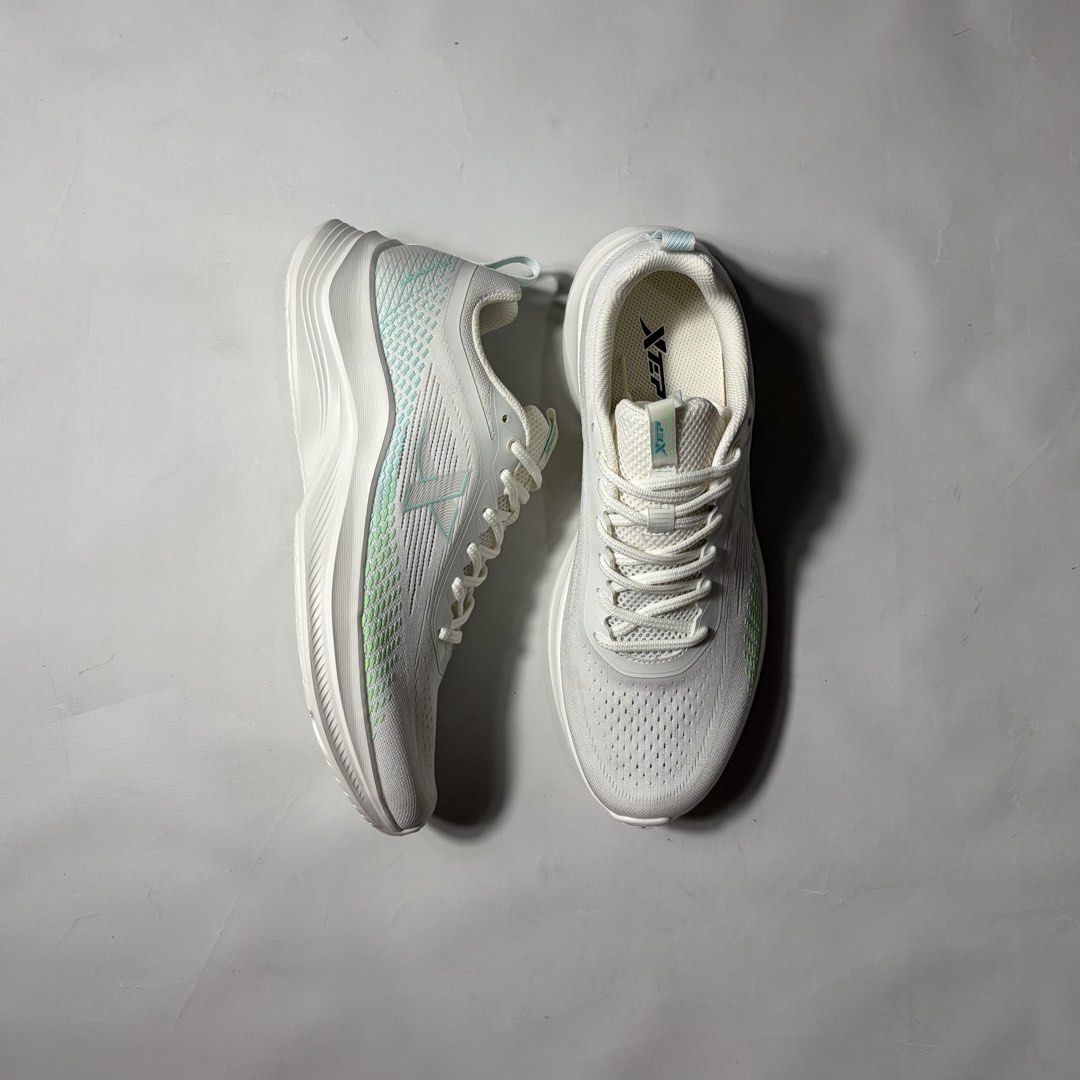 XEP White Running Shoes (Category: Sneakers) located in Baguio. Submitted by suffering (Listing ID 1444618217, Image 1). Description: - White XEP running shoes - Lightweight and breathable mesh upper - Comfortable sole for running - Perfect for training or everyday wear.