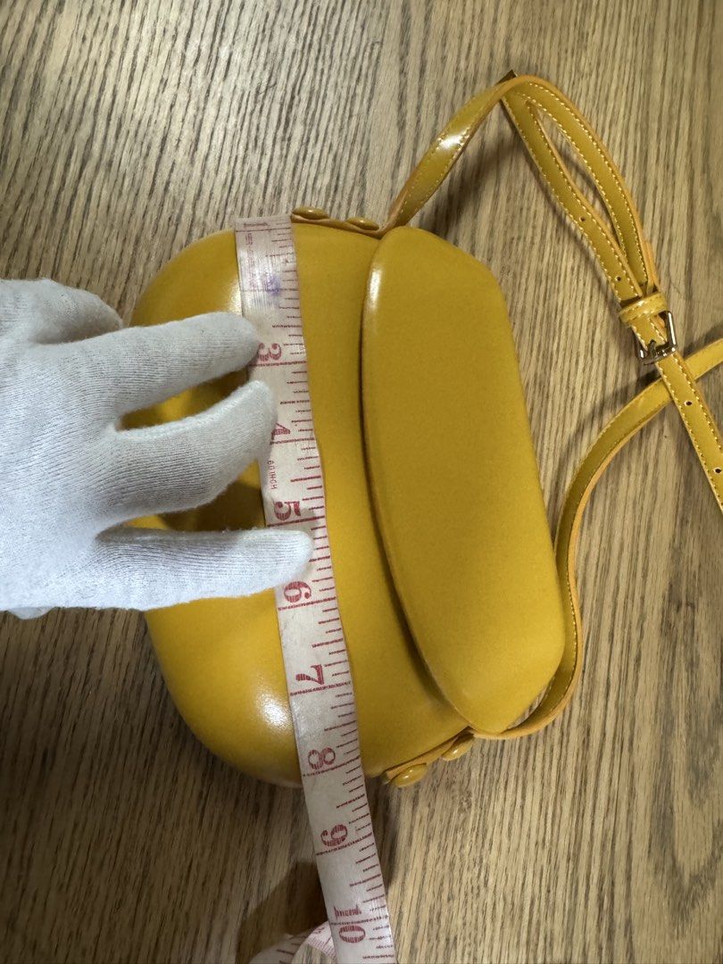 Yellow accent bag (Category: Cross-body Bags) located in Cainta. Submitted by simoun19 (Listing ID 1444624190, Image 3). Description: Hard material perfect for delicate items Synthetic leather Crossbody .