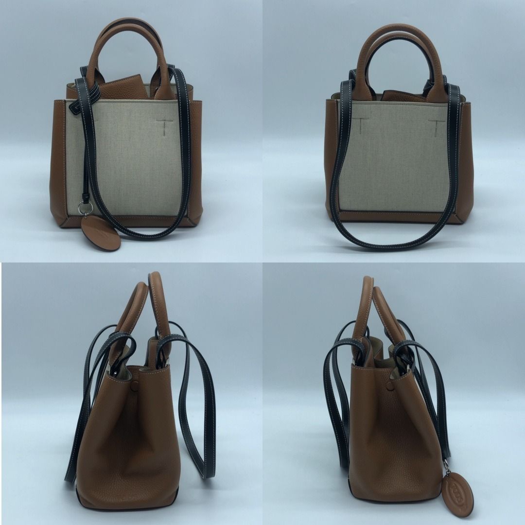 267005651 TODS BAG CANVAS DOUBLE UP TOTE (Category: Luxury Bags & Wallets) located in Taguig. Submitted by ecoring.ph (Listing ID 1444694321, Image 3). Description: ◆CONDITION: B+ ◆DESCRIPTIONS: (Other defects/info:) The bottom and bottom corners of the bag have minimal scuffing, stains, and press marks, and show signs of use. The longer top handle strap of the bag has minimal wrinkles and press marks. Overall, the bag remains in new and good con