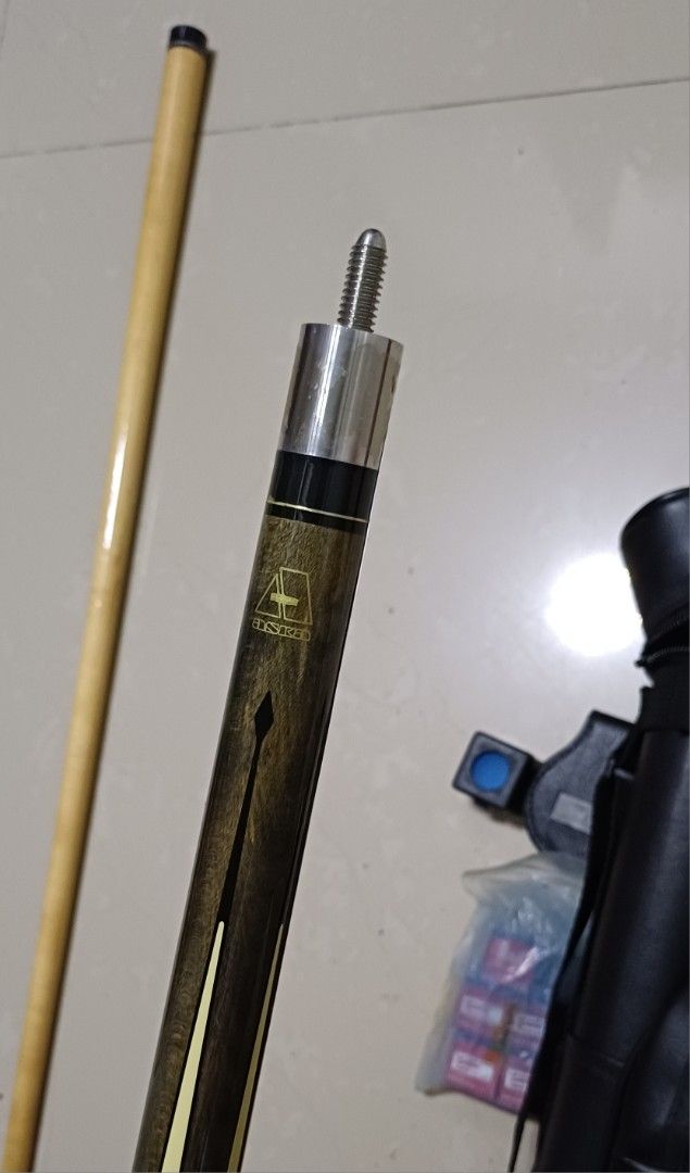 2-Piece Pool Cue with Case (Category: Billiards and Bowling) located in Bacoor. Submitted by ricks01 (Listing ID 1444814179, Image 2). Description: - 2-piece pool cue - Comfortable black grip - Secure threaded joint - Comes with a black protective case - Case features two internal compartments - Ideal for billiard games - Ready for its new owner.