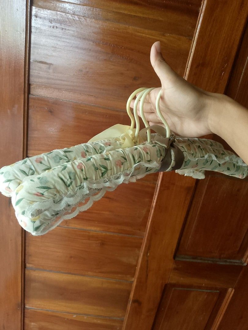 4 pcs Floral Padded Clothes Hangers (Category: Hooks & Hangers) located in Caloocan City. Submitted by chrysan_025 (Listing ID 1444765419, Image 3). Description: - Set of 4 padded hangers - Features a beautiful floral fabric covering - Elegant lace trim detail - Ideal for delicate garments like blouses and dresses - Prevents clothes from slipping off - Helps organize your closet neatly.