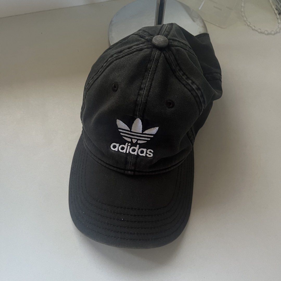 Adidas Cap Black Trefoil Logo (Category: Caps & Hats) located in Legazpi City. Submitted by hushedcry (Listing ID 1444800127, Image 1). Description: - Classic black Adidas cap - white embroidered trefoil logo on front - Striped lining with smaller Adidas logos inside - Adjustable strap at the back for a custom fit - no flaws, already washed 💌 mop: gcash only 📬 shipping via j&t express (sf c/o buyer) for inquiries, dont hesitate to send me a msg
