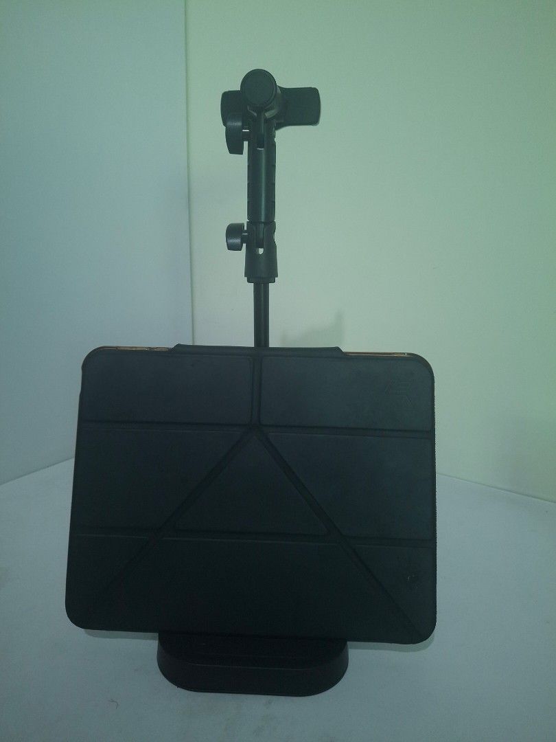Adjustable Desk Phone Stand Holder Mount (Category: Mounts & Holders) located in Quezon City. Submitted by reee_rei (Listing ID 1444724812, Image 3). Description: - RFS: extra - Adjustable black desk stand for phones and tablets. - Extendable and pivoting arm for optimal viewing angles. - Weighted base ensures excellent stability. - Securely holds your device in place. - Perfect for hands-free use at your desk or table..