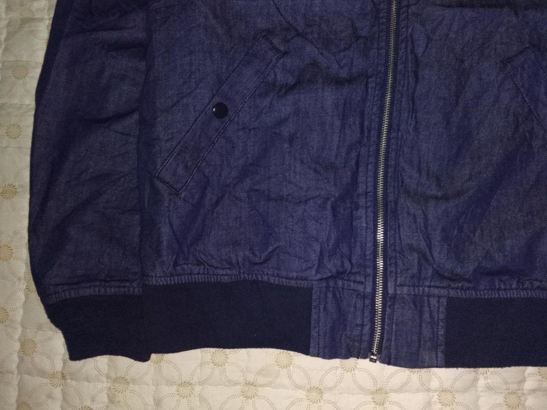 Alpha Industries MA-1 Denin Wash Bomber Jacket (Category: Coats, Jackets and Outerwear) located in Zamboanga. Submitted by zhumhazhav (Listing ID 1444691242, Image 3). Description: - Alpha Industries MA-1 bomber jacket - Dark blue denim wash - A classic MA-1 style - Zippered sleeve pocket - Ribbed collar,cuffs & hem - 2 front pockets with snap closures - Ideal for layering - Versatile wardrobe addition - Size medium tag - Dimensions Width 21 Leng