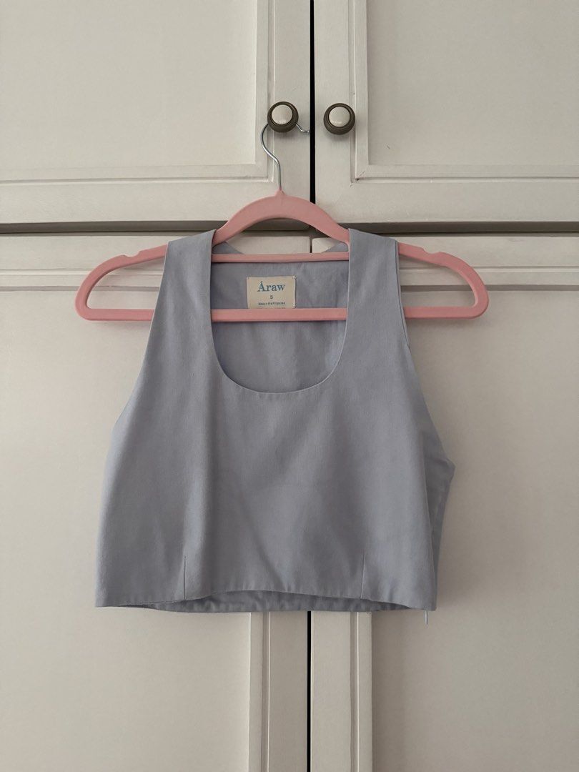 Araw Angelite Light Blue Melfi Top (Category: Sleeveless) located in Makati City. Submitted by michi_ (Listing ID 1444821720, Image 1). Description: - Araw Melfi Top in Angelite - Racerback with scoop neckline RFS: Doesn’t fit anymore.