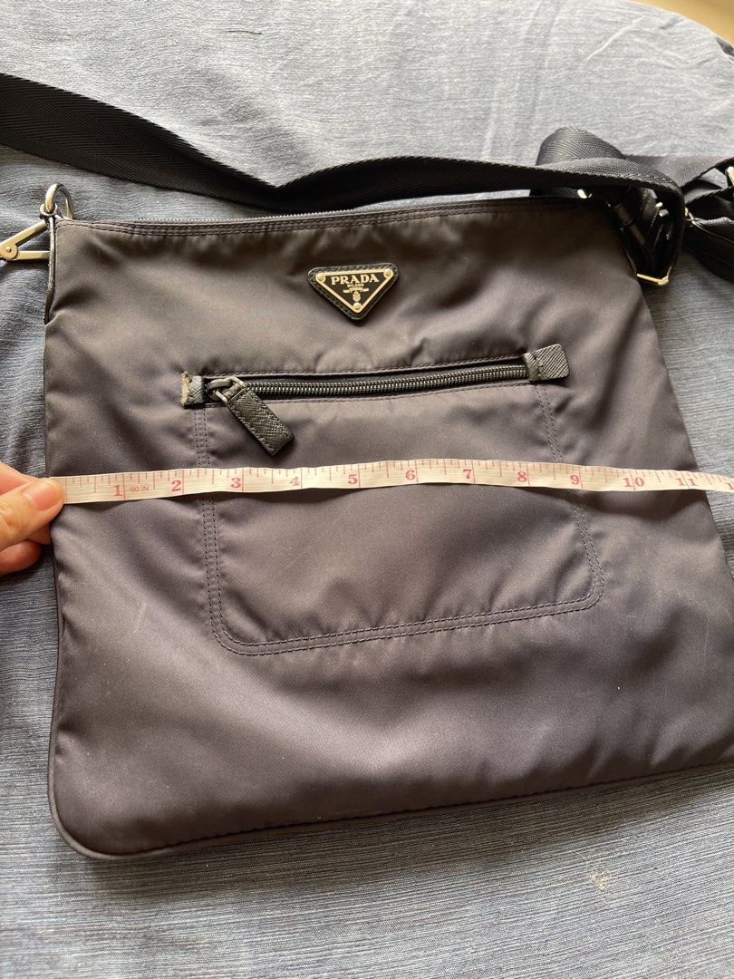 Authentic Prada Nylon Crossbody Bag Navy Blue (Category: Luxury Bags & Wallets) located in Taguig. Submitted by supplementary (Listing ID 1444746323, Image 3). Description: - Authentic Prada crossbody bag Flaws in the picture.